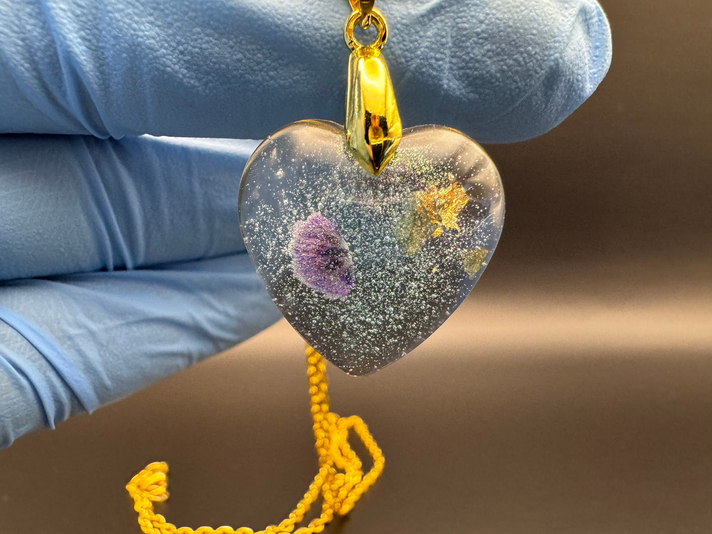 Dried Purple Flowers with Gold Leaf & Fine Glitter in Clear Heart Epoxy Resin Long Gold Chain Pendant