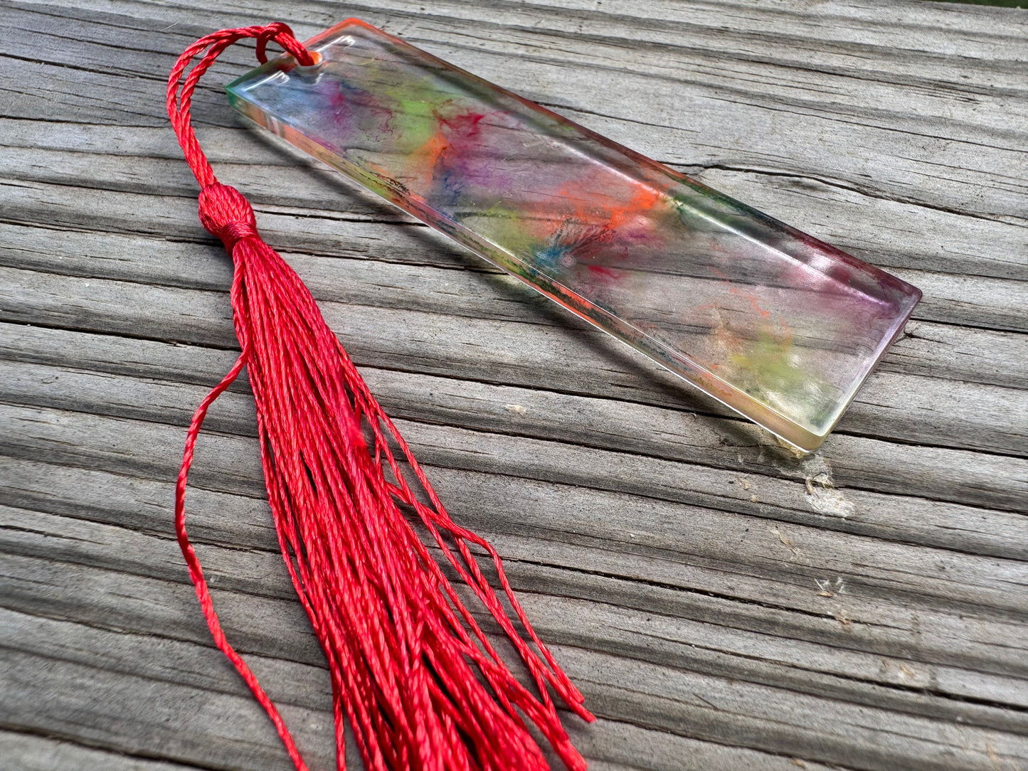 1.2 x 3.8 Flexible Bookmark UV Rainbow Clear Marbled Resin with Red Tassel