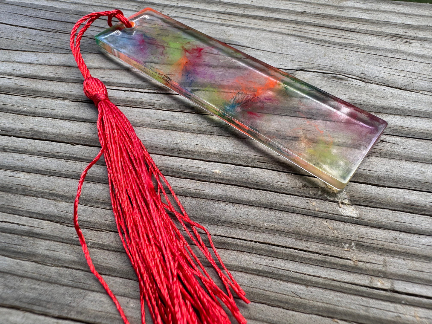 1.2 x 3.8 Bookmark UV Rainbow Clear Marbled Resin with Red Tassel